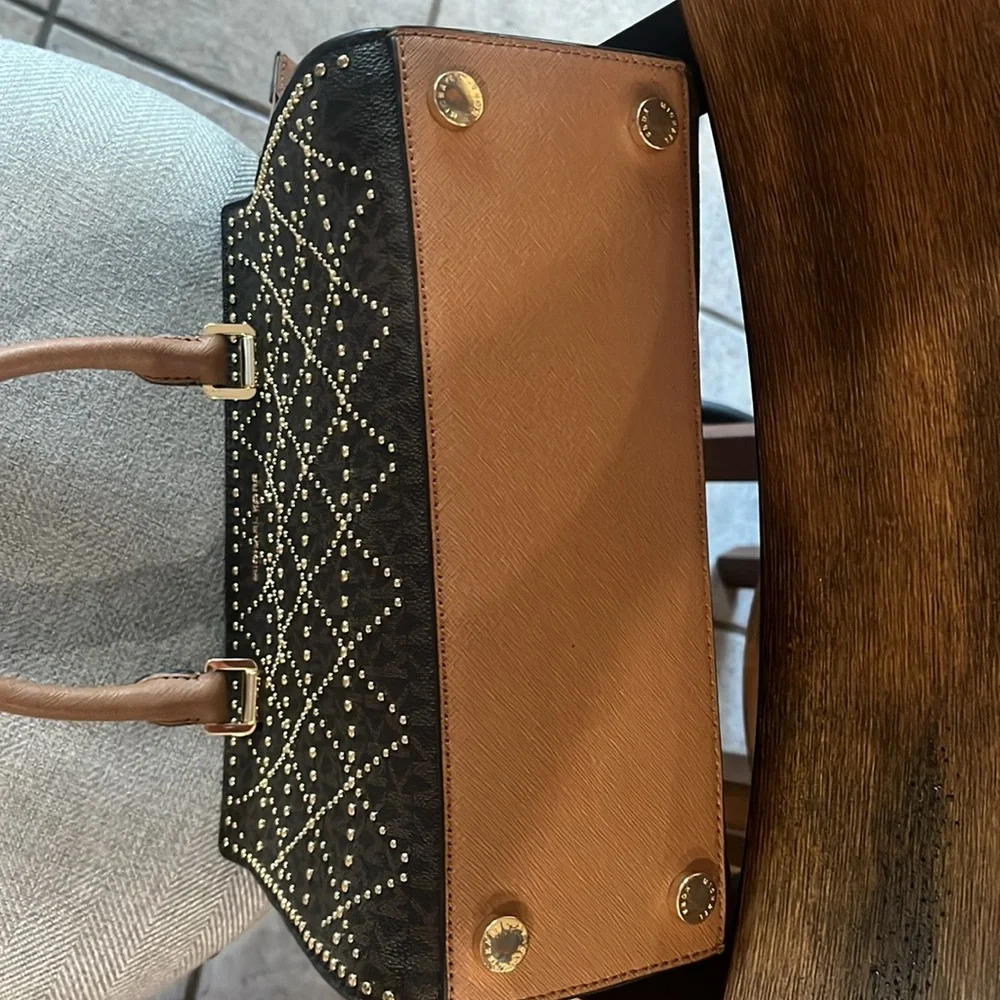 Michael Kors Brown and Tan Studded Satchel
11’9 inside zipper and wristlet . - Picture 3 of 4